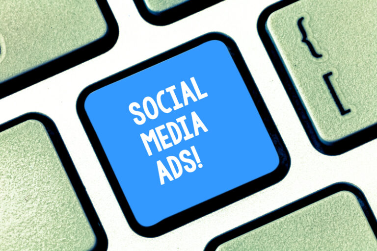 Virtual computer keyboard. one key with social media ADS displayed on it. social media AD specialist